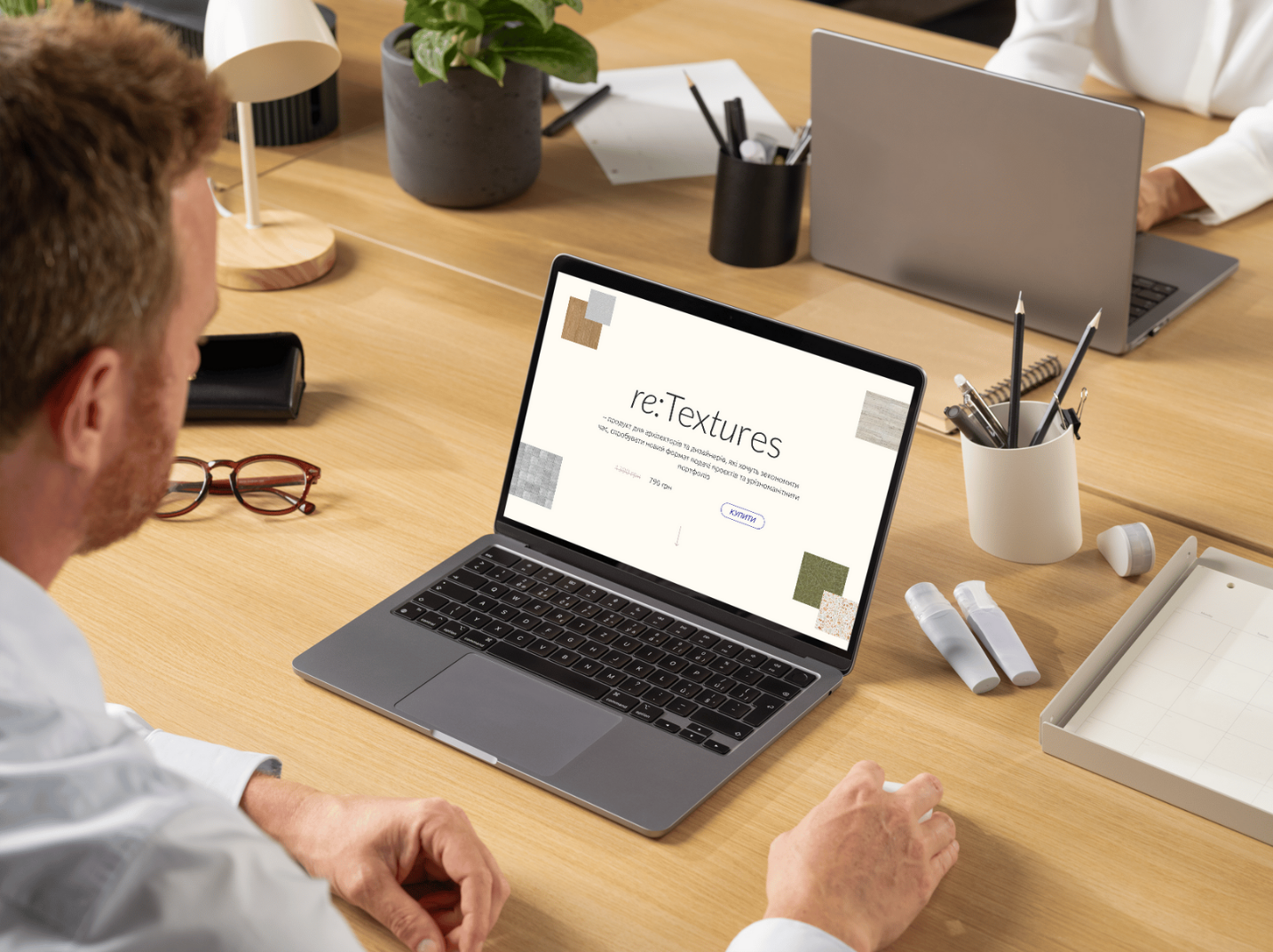 Graphic depicting a hexagonal cropped photo of an interior room design with grid lines along its borders.